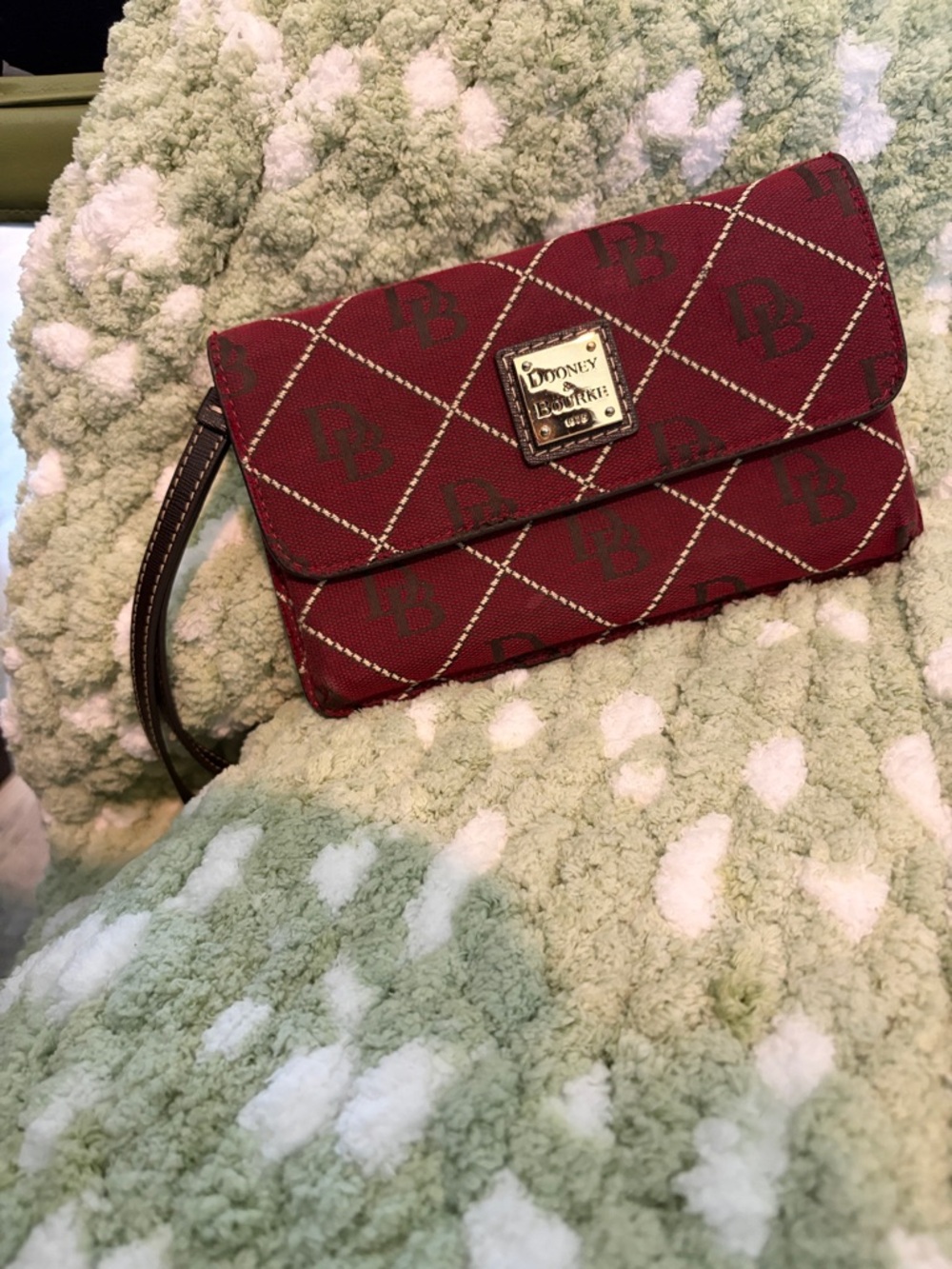 Dooney & Bourke Burgundy Logo Wristlet with Gold Plaque